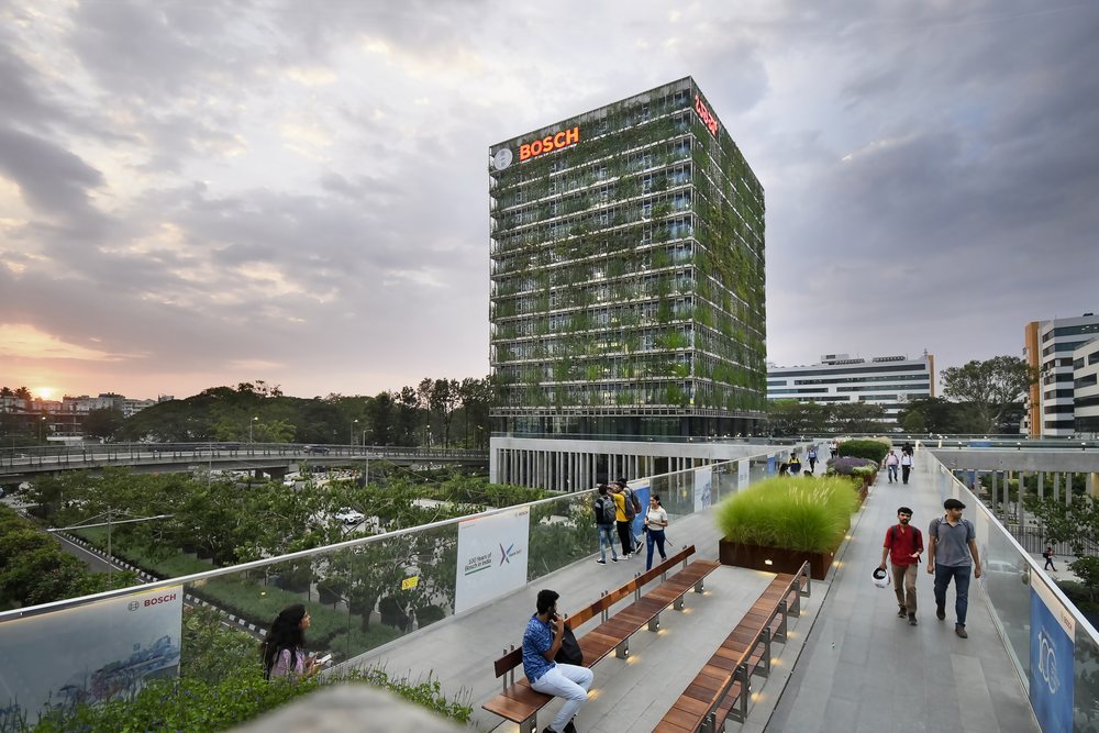 A green corporate campus photographed at dusk